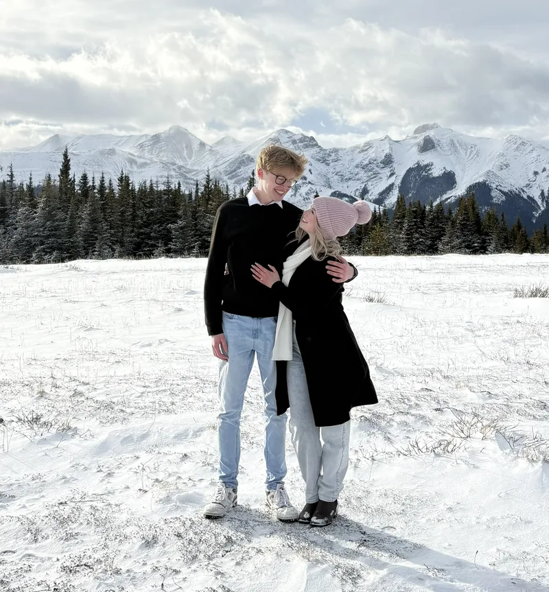 Matthew and Kelsey smiling together in the snow